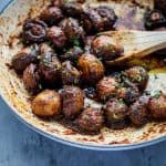 a pan of sauteed mushrooms