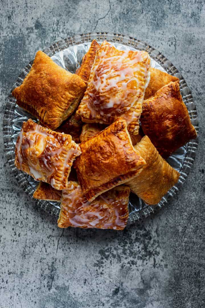 a crystal platter filled with toaster strudel taken from overhead