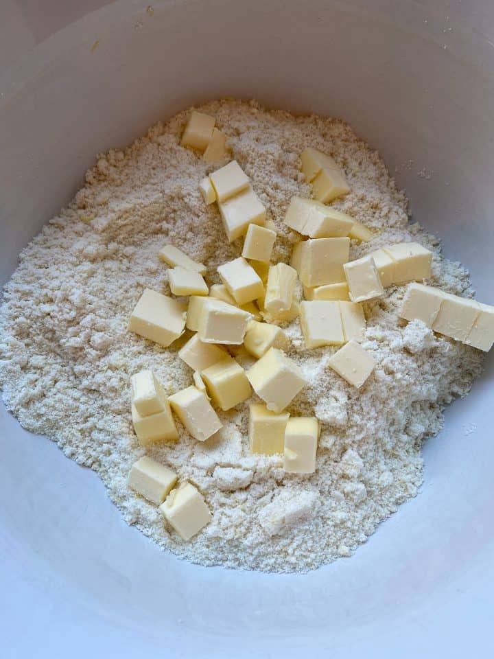 very cold cubed butter in dry ingredients