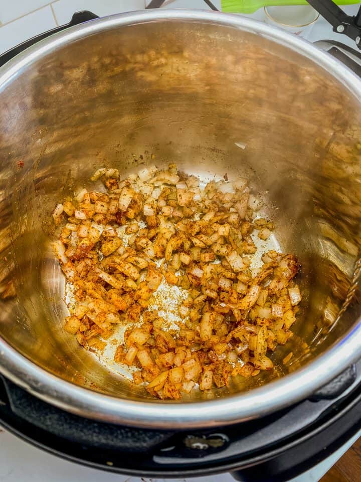 pressure cooker with sautéed onions
