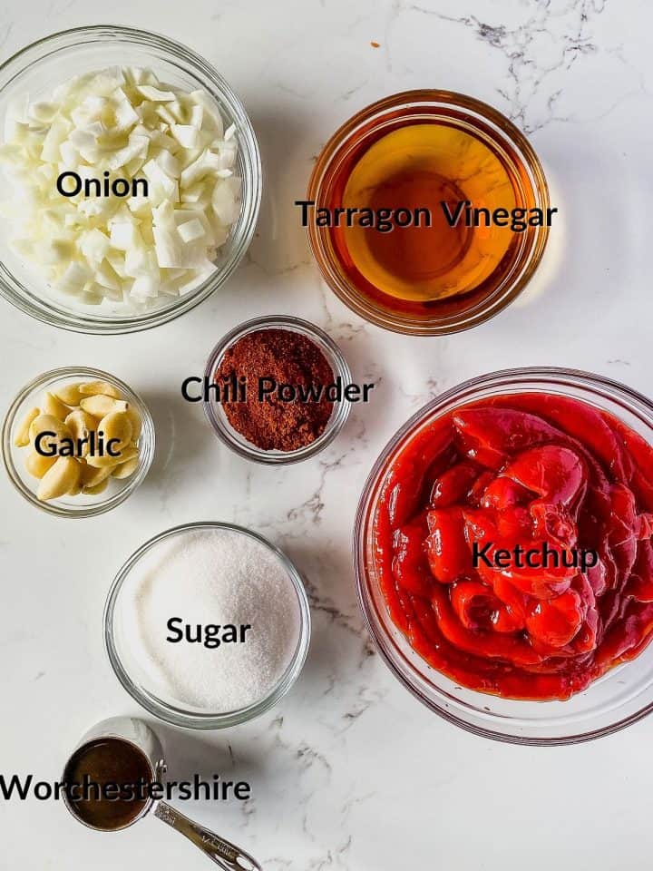 bbq sauce ingredients with text label showing ketchup, onion, Worcestershire, sugar, garlic, chili powder and tarragon vinegar